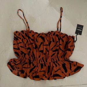 Adorable crop top!! Must have for summer night out or fun day outfit.